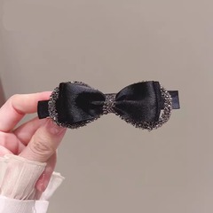軽くて豪華な質感の蝶結びのヘアピンの小さい香風の黒い一字は後頭部の髪を挟みます。