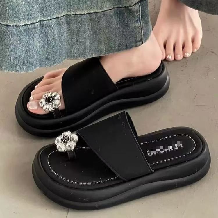 2026 verano nuevo estilo simple de moda de vacaciones de hadas sandalias de playa de viento de dedos de los dedos para usar zapatillas frías para mujeres