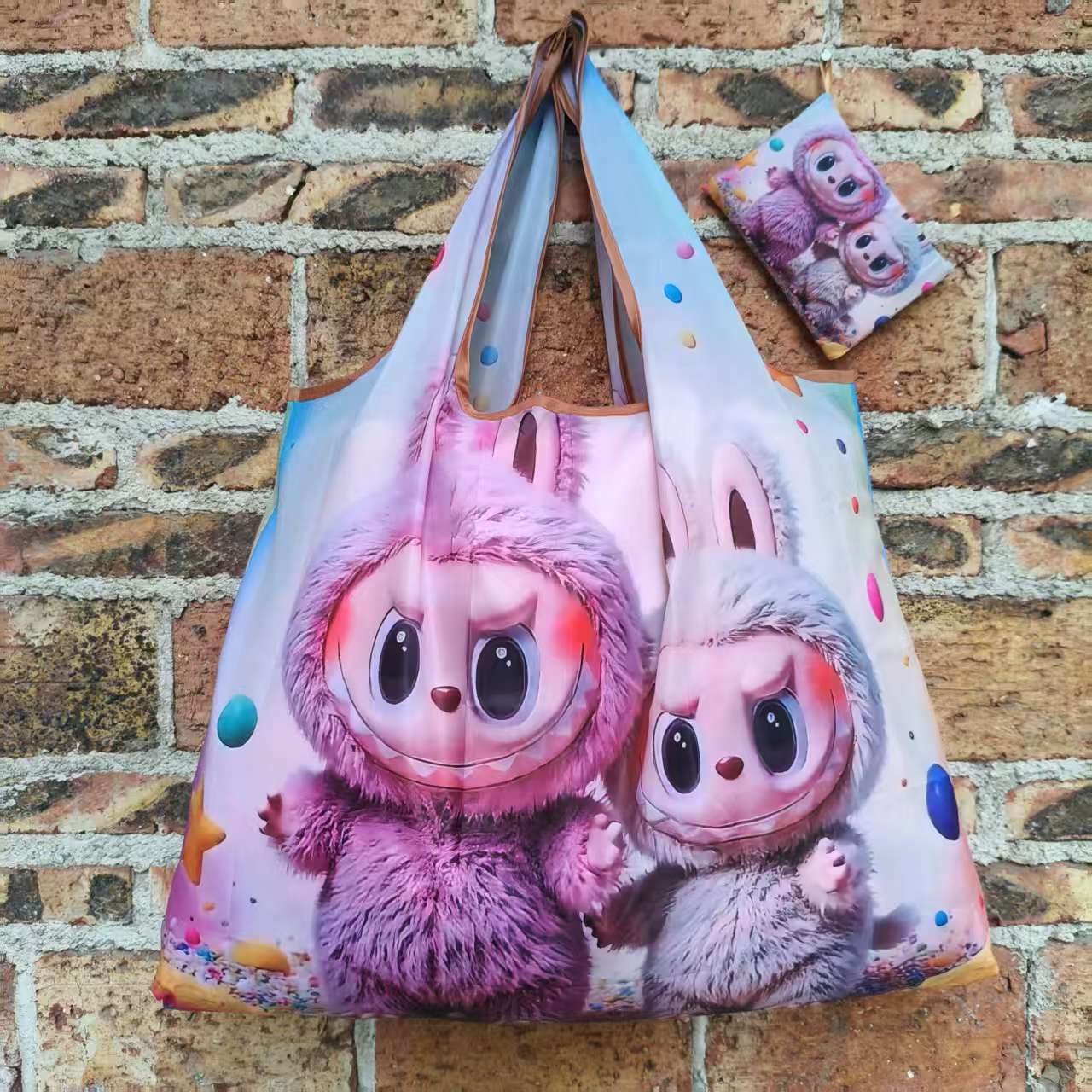大型アニメスポット折り畳み環境保護レジ袋携帯袋が軽くて、野菜バッグを買って収納するファッションを繰り返している