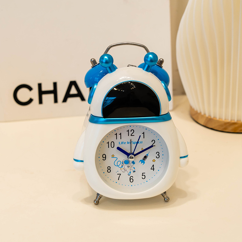 Venta directa de fábrica astronauta pequeño reloj de alarma niños reloj despertador estudiante especial despertador artefacto dibujos animados reloj de alarma de escritorio