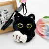 Full-body black cat with white fish motif
