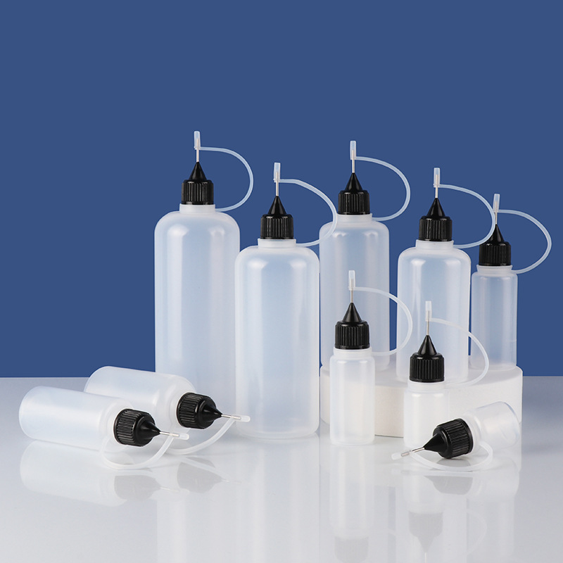 Fabricante en stock botella de aguja 10ml30ml botella de aceite esencial pe plástico semipermeable pigmento pegamento botella de inyección de pintura suave botella