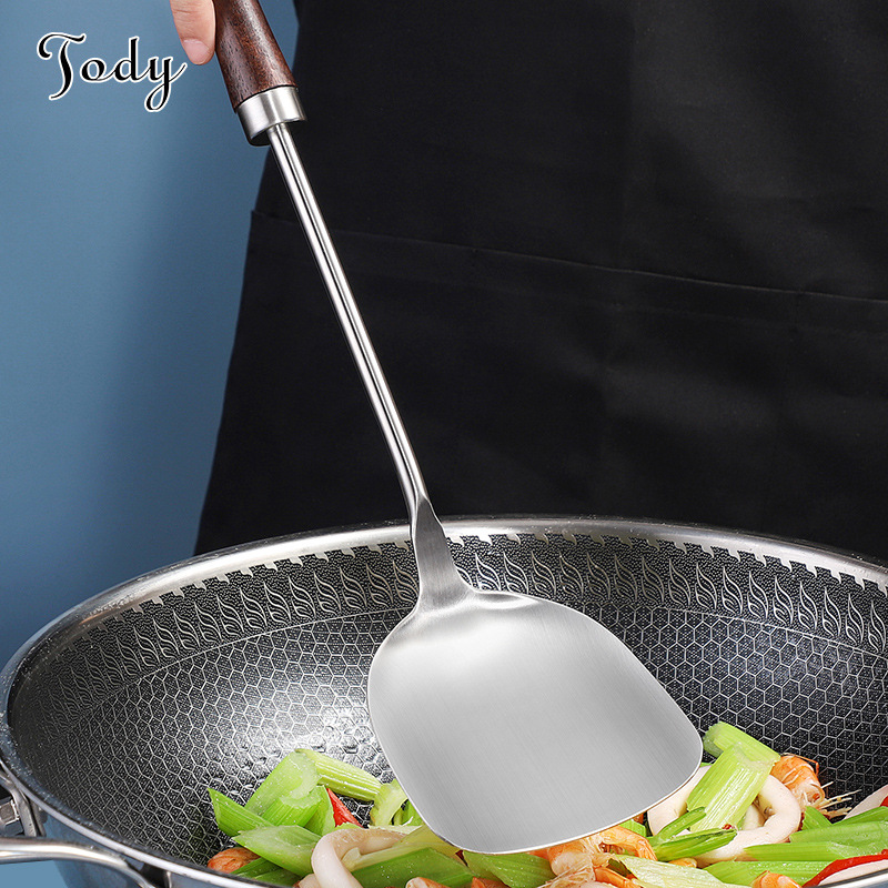 304 espátula de acero inoxidable cuchara de sopa al por mayor gran drenaje freír pala mango de madera utensilios de cocina Hotel no-Pala de freír magnética al por mayor
