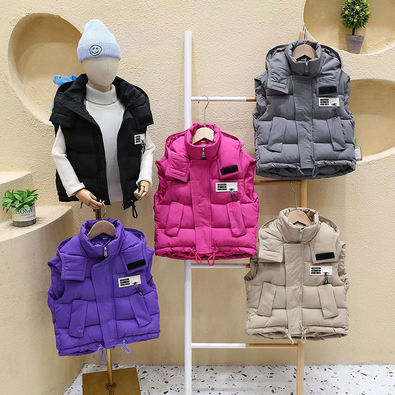 Chaleco de algodón infantil primavera y otoño 2025 nuevo otoño y invierno niños pequeños y medianos niñas chaleco de algodón plumón hombro vestido exterior