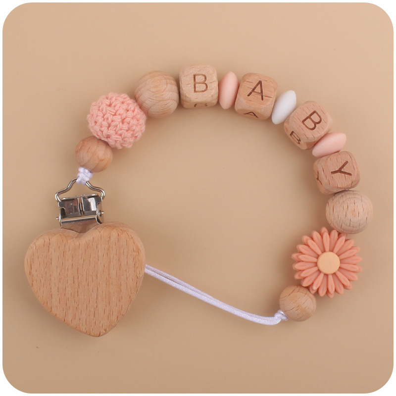 Nuevo bebé haya melocotón corazón calmante bebé DIY dibujos animados Margarita cuentas de silicona mordedura pezón cadena