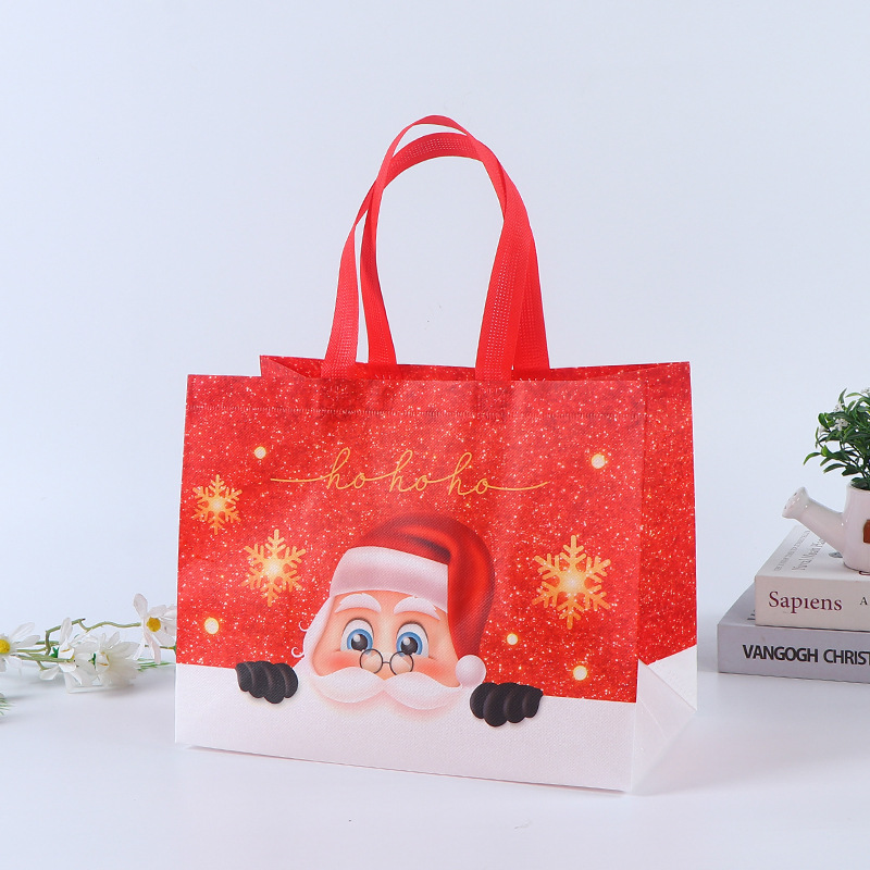 Bolso de Navidad de punto transfronterizo, bolsa de embalaje de regalo, bolsa no tejida laminada en caliente plegable portátil personalizada