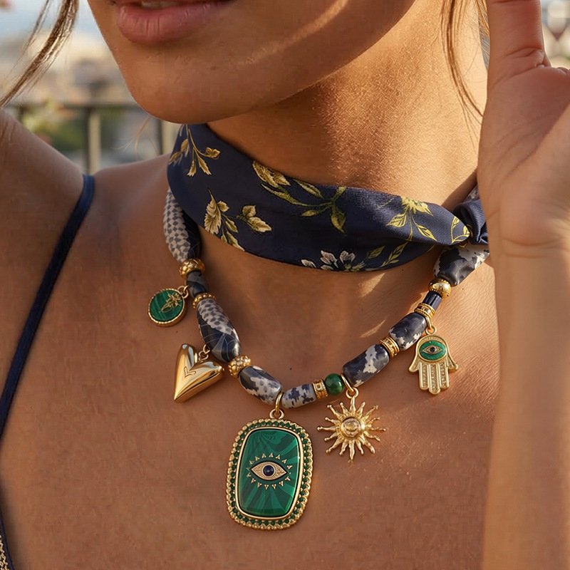 TENA estilo francés retro clásico viento diablo ojo colgante bufandas collar ligero lujo alto sentido collar medieval al por mayor