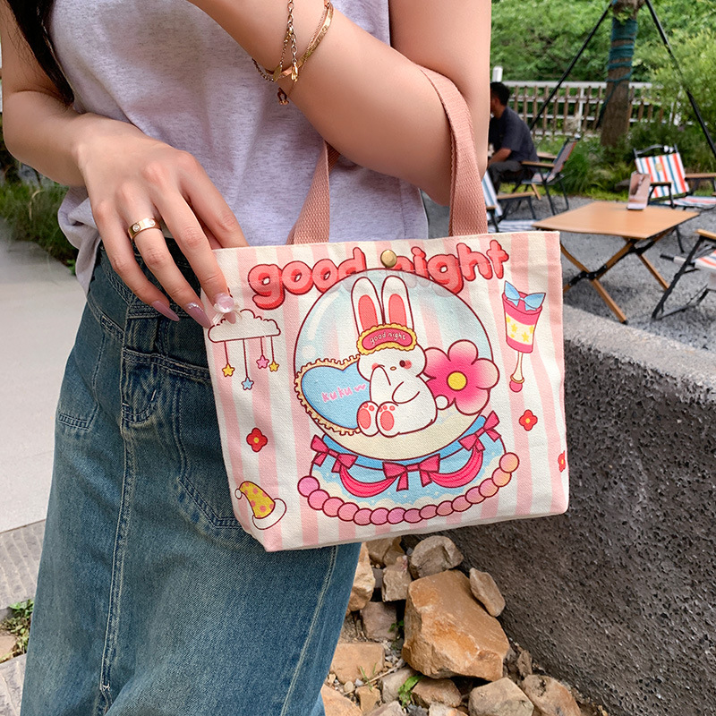 简约卡通手提帆布包女迷你手拎包2025新款上班饭盒袋遛弯小包批发