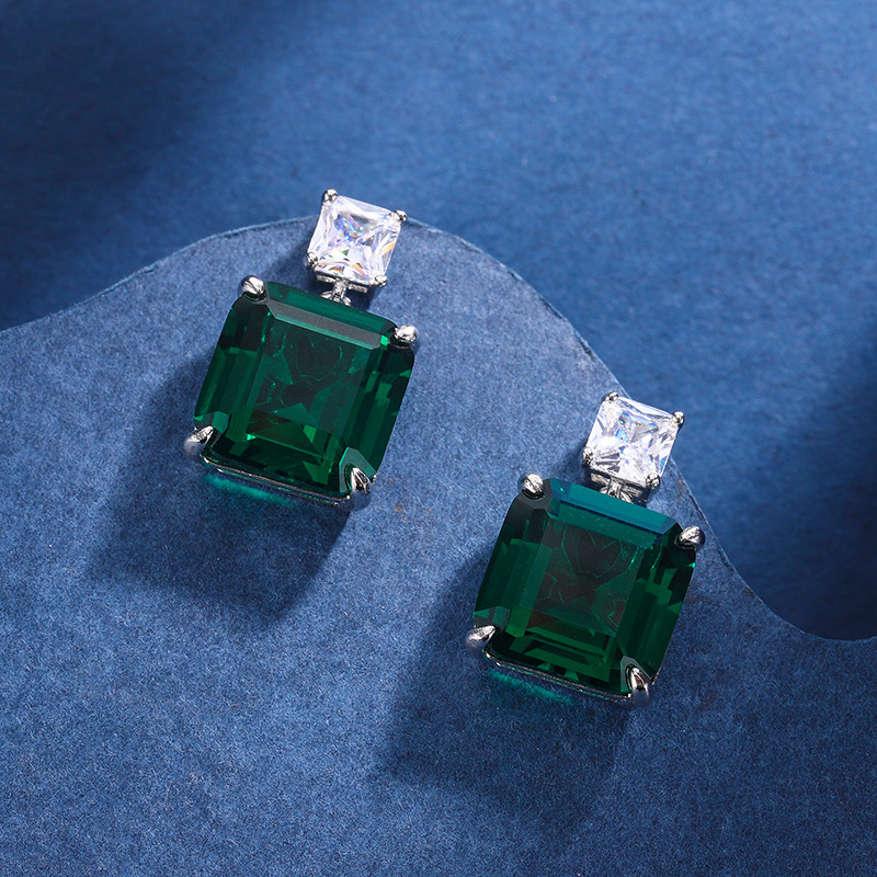 Zhuang Sheng joyería cobre inferior chapado en oro simulación paloma rojo sangre corindón verde nano nicho temperamento traje piedra principal 12*12