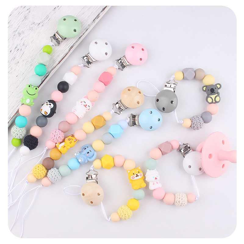 Productos para bebés y niños clip de tetina de madera 3D dibujos animados animales perlas de silicona DIY calmar bebés tetina cadena anti-caída cadena