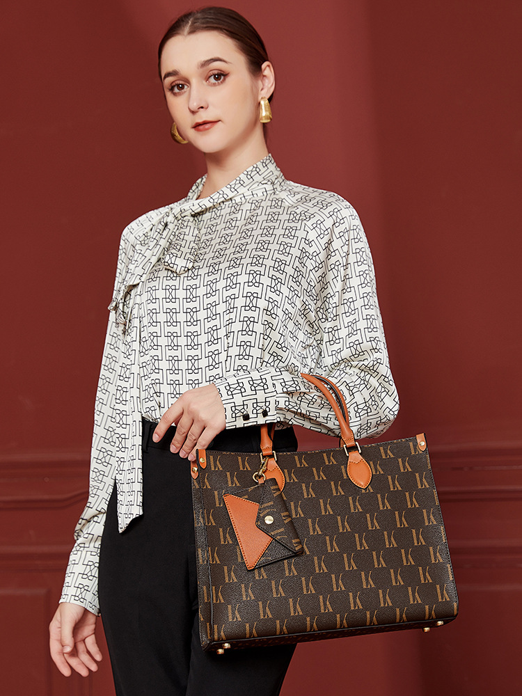 Hong Kong Echtes Leder 2023 Neue Mode Vielseitige Große Kapazität Gedruckt Handtasche frauen Tote Big Bag_voghion.com