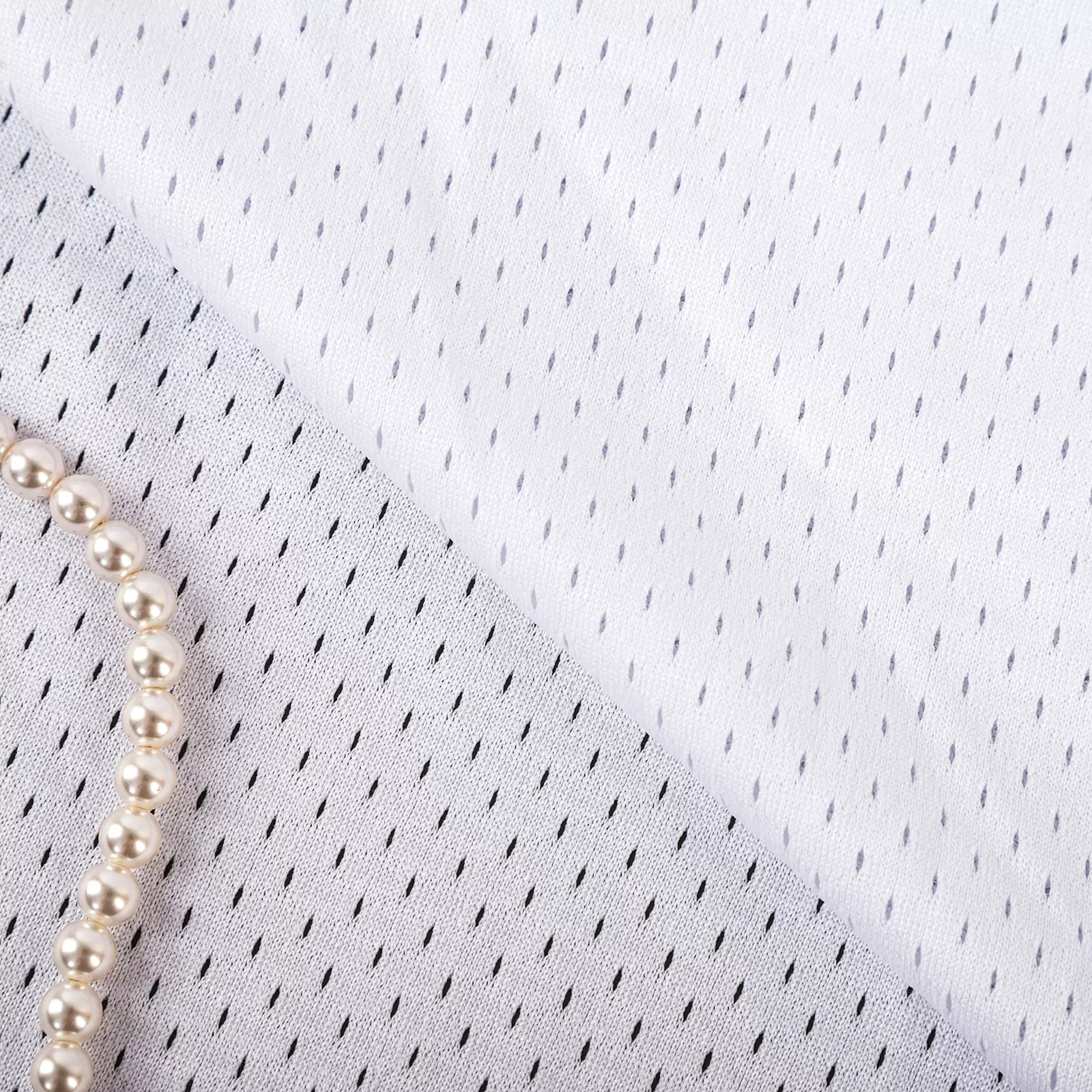 219#低弹洞洞布网眼布 里料涤纶布沙滩裤篮球服经编11空1洞布批发