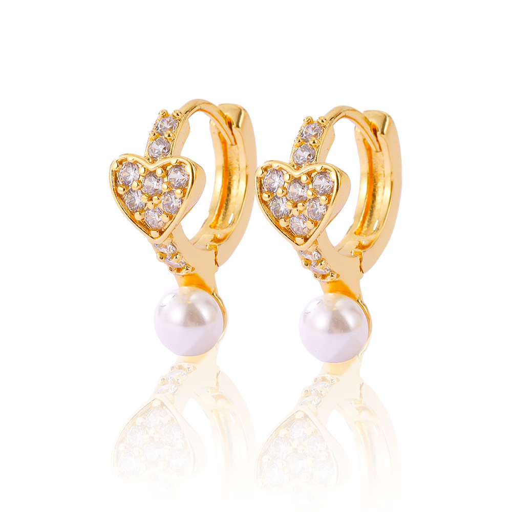 2024 nuevos aretes de perla de zircón de cobre dorado joyas transfronterizas de moda de mujeres aretes de estilo múltiple aretes de perla de zircón