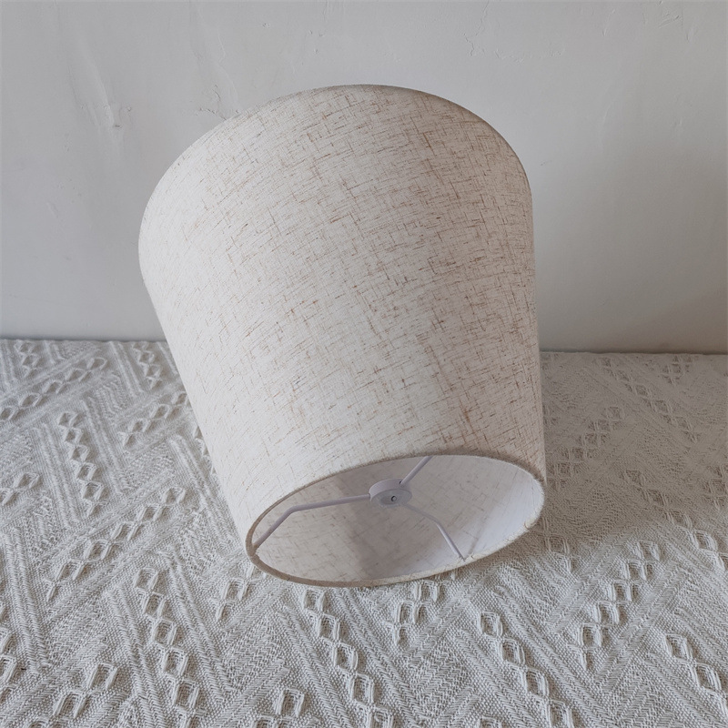 Amazon estilo americano pequeño redondo de hierro vaca esquina soporte lámpara de mesa accesorios pantalla cubierta de la cáscara redonda de lino sombreado de tela