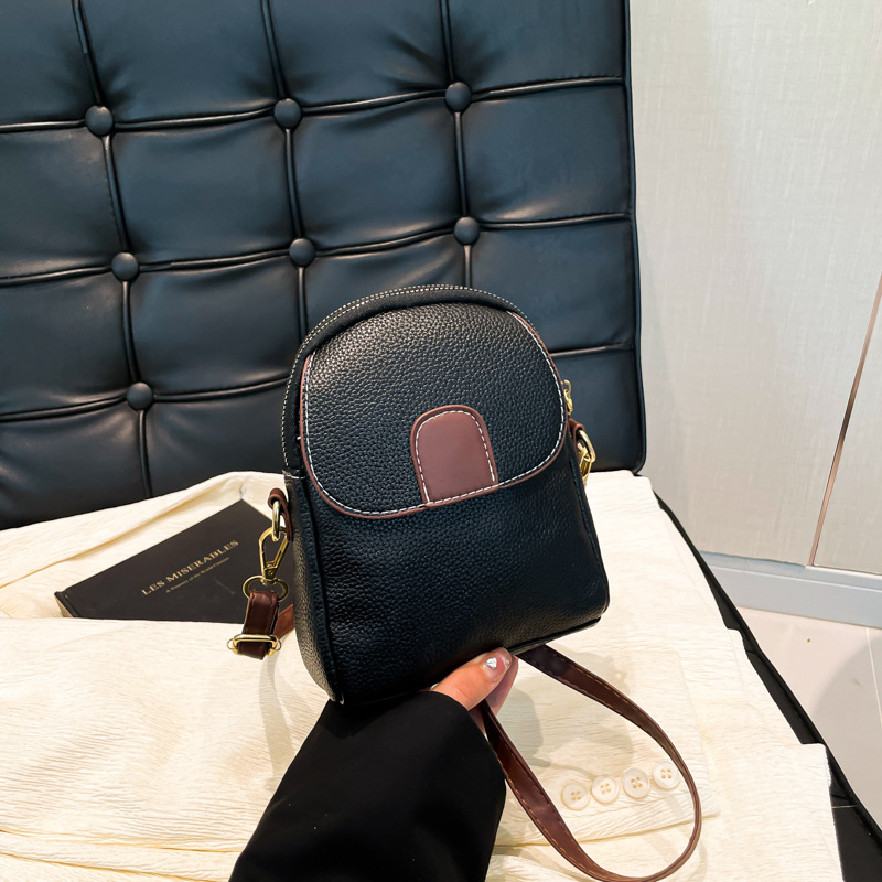 2024 invierno nuevo estilo de moda extranjero bolso de hombro bolso de moda para mujeres bolso de teléfono móvil bolso de mochila europea y americana bolso pequeño