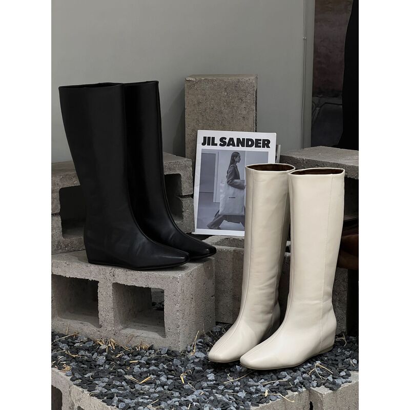 Top-grade sheepskin 2026 autumn and winter new French minimalist style retro height-increasing long boots for women Top-grade sheepskin 2026 autumn and winter new French minimalist style retro height-increasing long boots for women