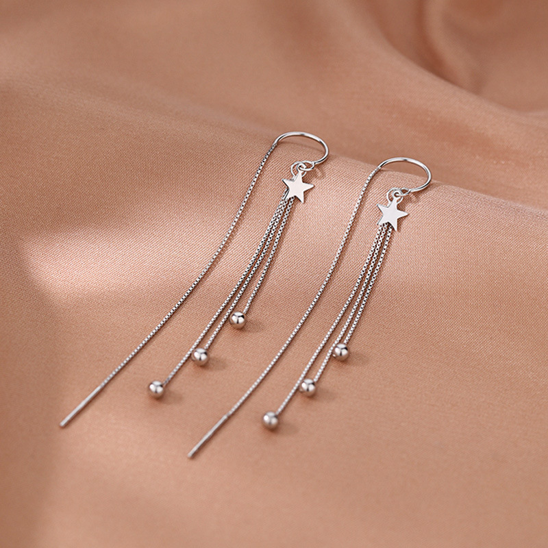 Pendientes largos con borla y estrella, estilo francés elegante y romántico, cuentas luminosas, diseño exagerado para mujer