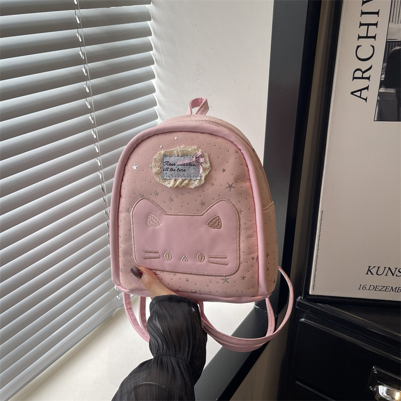 2026 nueva universidad estampada estrella mini mochila de estudiantes niña caricatura gato mochila pequeña