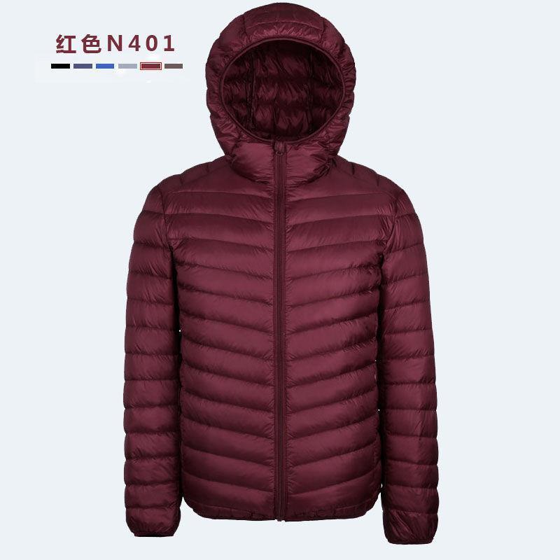 2021 Otoño e Invierno Chaqueta ligera de algodón acolchado con capucha chaqueta casual corta de los hombres coreanos abrigo de talla grande joven y mediana edad