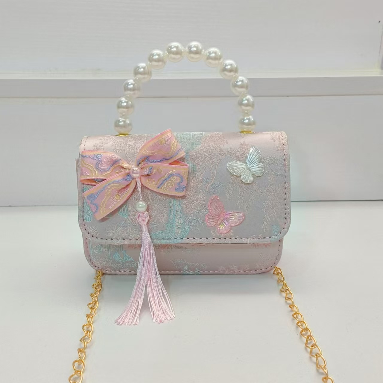 Bolsa de arco de estilo nacional de la princesa bolso de perla bolso de cadena bolso cuadrado bolso accesorios de ropa china para niños regalos de vacaciones de niñas
