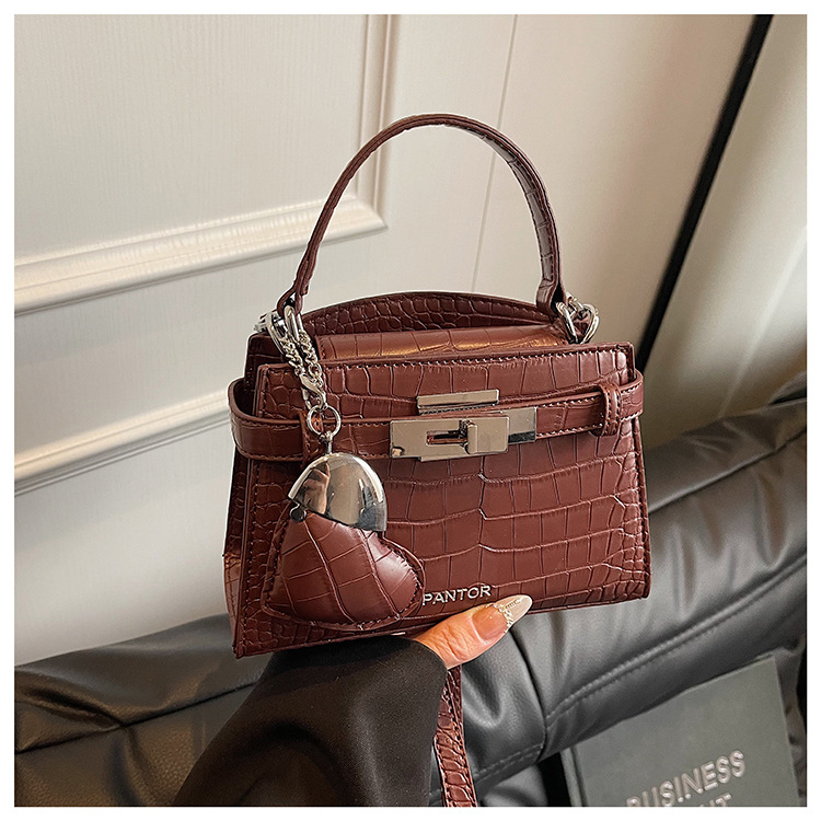 Bolso de mano de alta gama para mujer 2025 nuevo estilo retro patrón de cocodrilo Kelly bolso de mensajero de un solo hombro casual simple