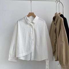 綿春秋の日本の小さい衆の長袖のシャツはゆったりしています。