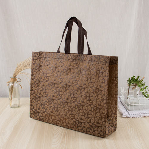 New embossed non-woven bag hand shopping bag clothing handbag LOGO advertising gift bag