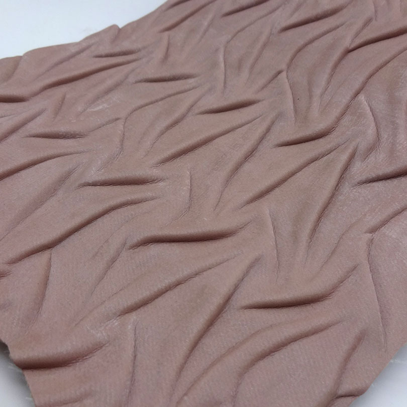 皮革压皱加工压花压折加工