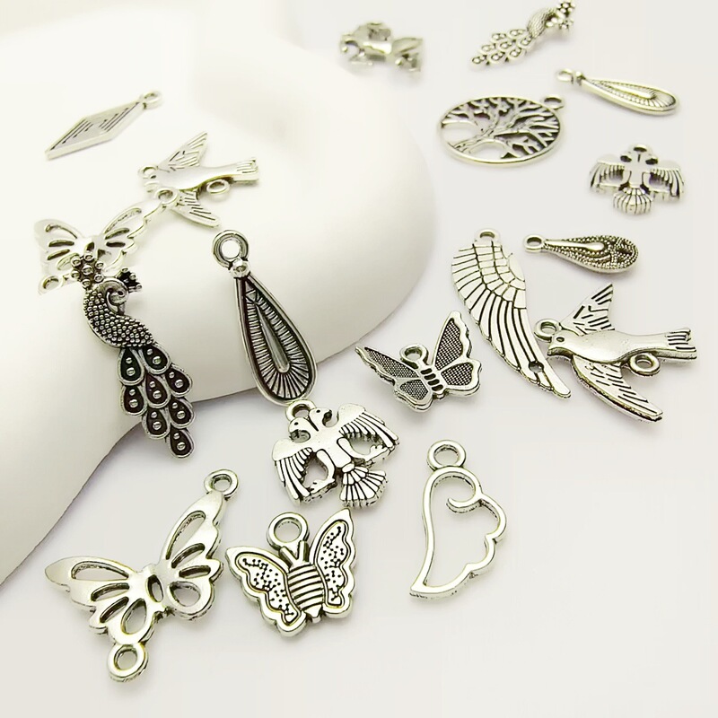 Ancient silver alloy peacock small butterfly pendant diy bracelet necklace animal wings earrings pendant accessories wholesale
