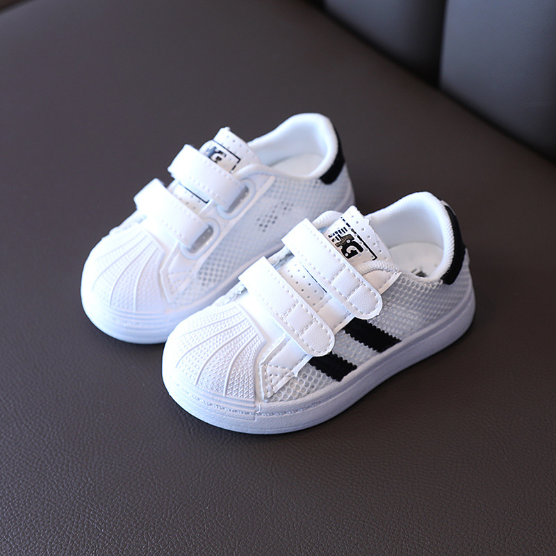 2021 nya barns lilla vita 1-6 år gamla skalbräda för män och kvinnor ihåliga meshskor Mjuk sula Babysport_voghion.com