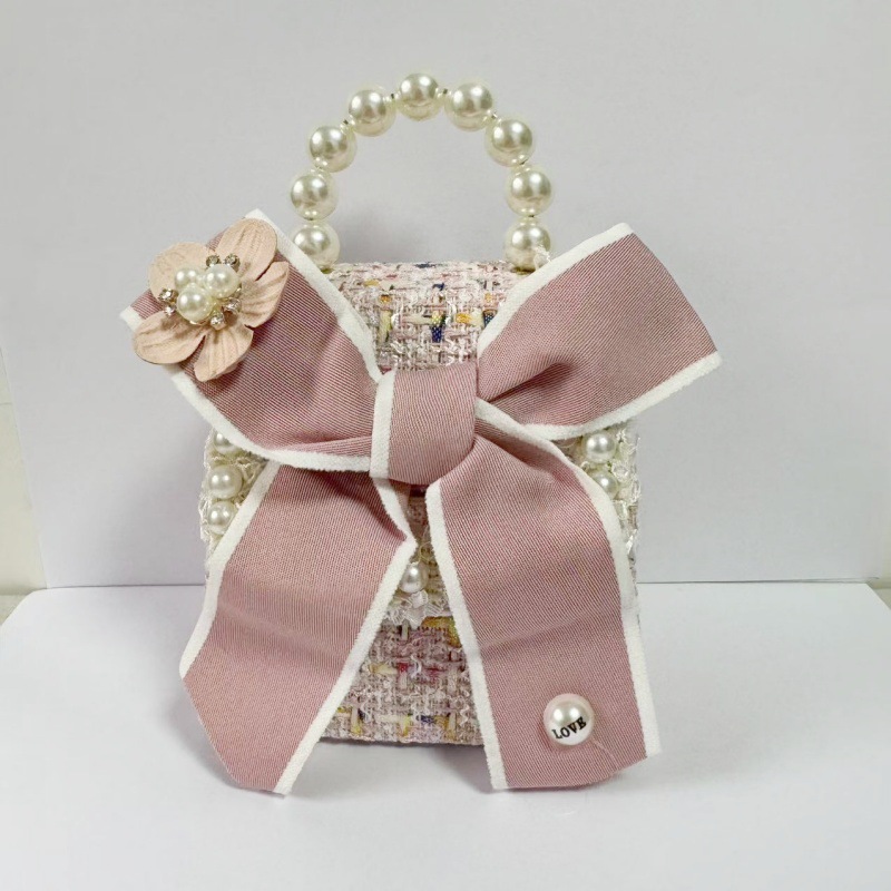2025 primavera y verano estilo caliente moda casual niños dulces bolsa de gelatina mini bolso de mensajero de un solo hombro variedad al por mayor