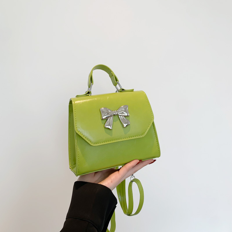 2025 nuevo estilo francés personalidad mochila de hombro de mujer alta sensación de moda simple de hombro de mano pequeña bolsa de mano coreana