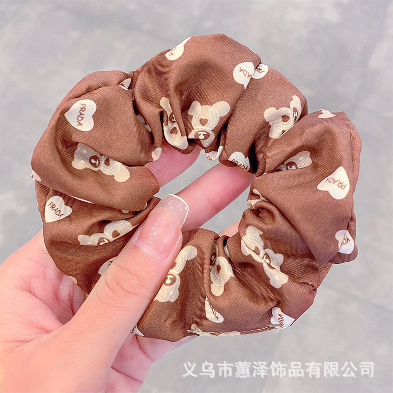 乳茶色の大腸の髪輪ネットの赤い紐の復古の百合の髪縄の肥えた腸の気質の少女は髪の毛の皮の筋を刺して髪を飾ります。|undefined