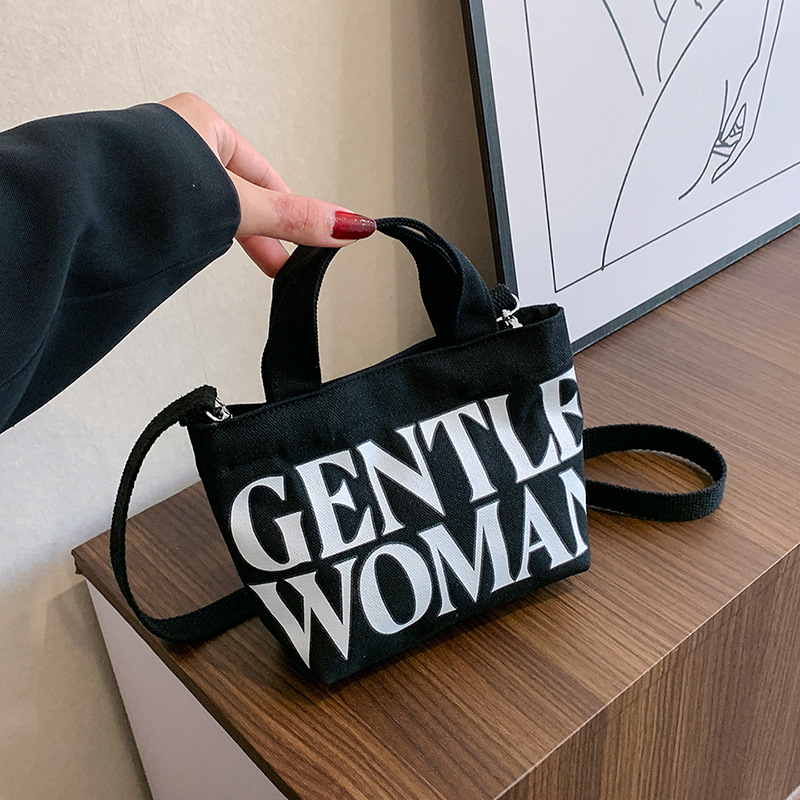 [업그레이드 지퍼 스타일] 흰색 글자가 새겨진 GW 검정색 가방