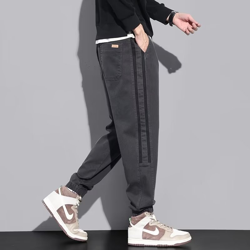 Pantalones casuales, marca de moda de otoño e invierno para hombres, pantalones bonitos, pantalones largos de Harlan de mezclilla de nuevo estilo, marea de gran tamaño para hombres