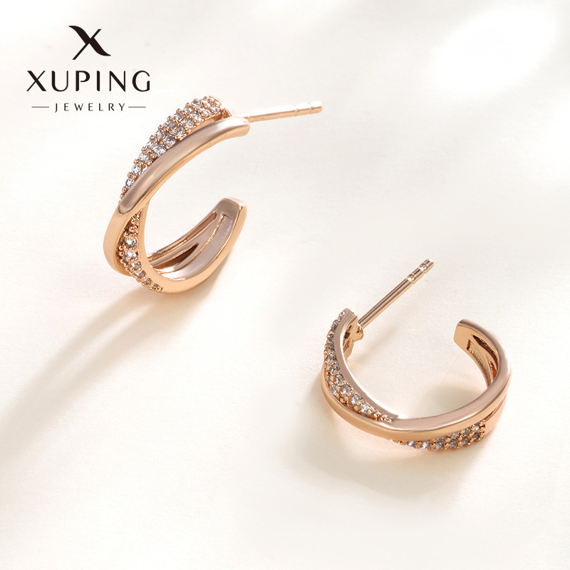 Xuping temperamento medio arco hueco diamantes pernos cruzados de moda japonesa y coreana diseño dulce pendientes lujosos para mujeres