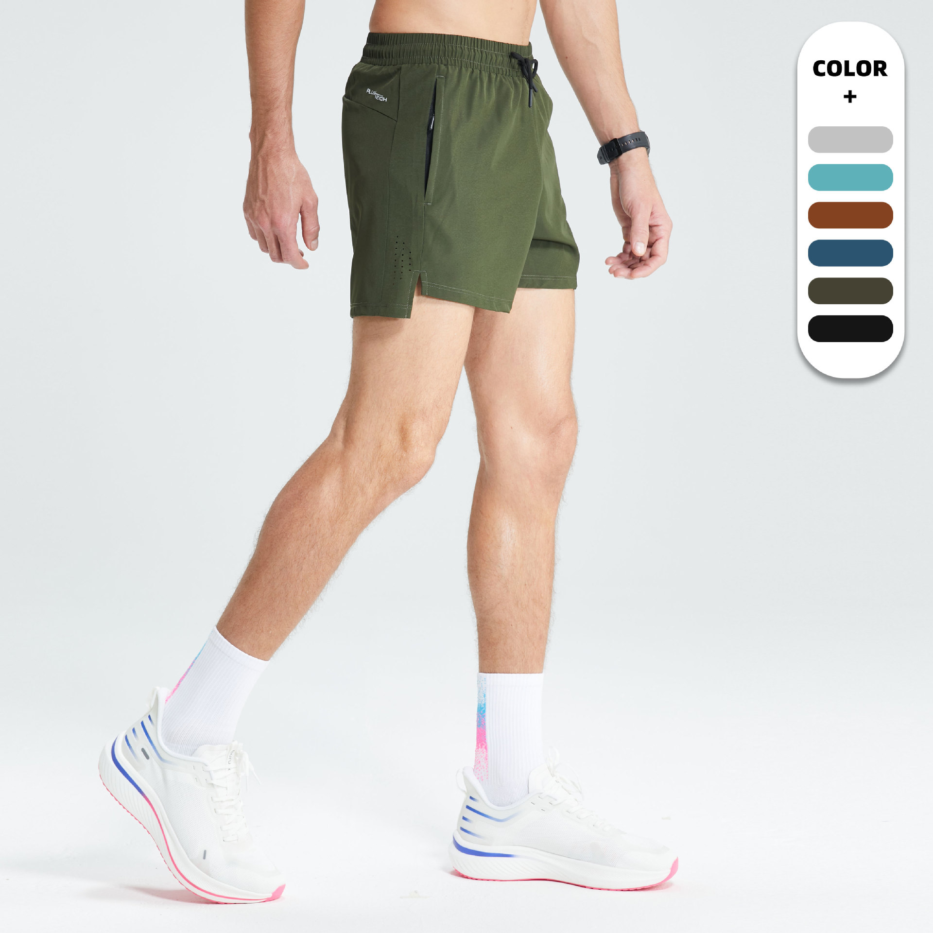 Pantalones cortos deportivos elásticos de cuatro lados tejidos para hombres corriendo maratón pista y campo pantalones de tres puntos malla de secado rápido pantalones cortos de fitness transpirables