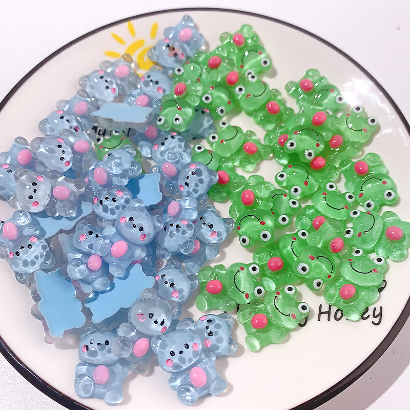 Accesorios de resina de rana de explosión DiDi dibujos animados transparentes animales abrazadera de cabello agujero de cuerda agujero de botón de zapato material de parche de caso de teléfono móvil