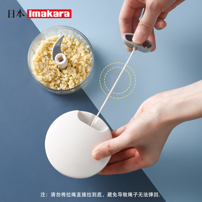 イクラのニンニクをつぶした器はニンニクの蓉の泡を打って粉砕機をかき混ぜます。|undefined