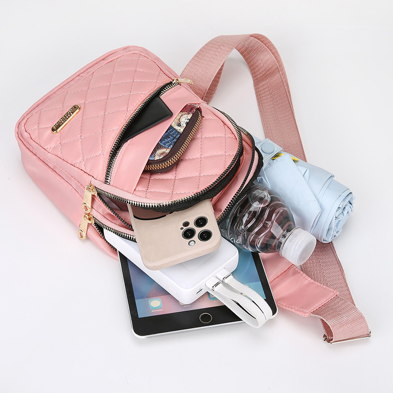 Nuevo bolso de pecho de moda de diamante de lujo ligero para mujeres, bolso de hombro de nicho de gran capacidad, bolso de transporte simple al por mayor