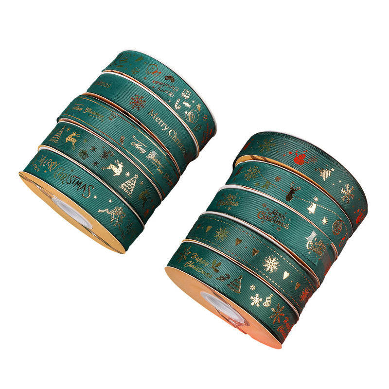 クリスマスリボン卸売 2.5cm クリスマスリボン メリークリスマス文字金箔入りリボン|undefined