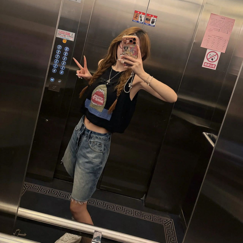 Summer Korean-Style Cartoon Print Loose Sleeveless Vest for Women, Versatile Casual Top, Straight-Leg Denim Shorts Summer Korean-Style Cartoon Print Loose Sleeveless Vest for Women, Versatile Casual Top, Straight-Leg Denim Shorts