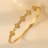 Golden bracelet, four-leaf clover