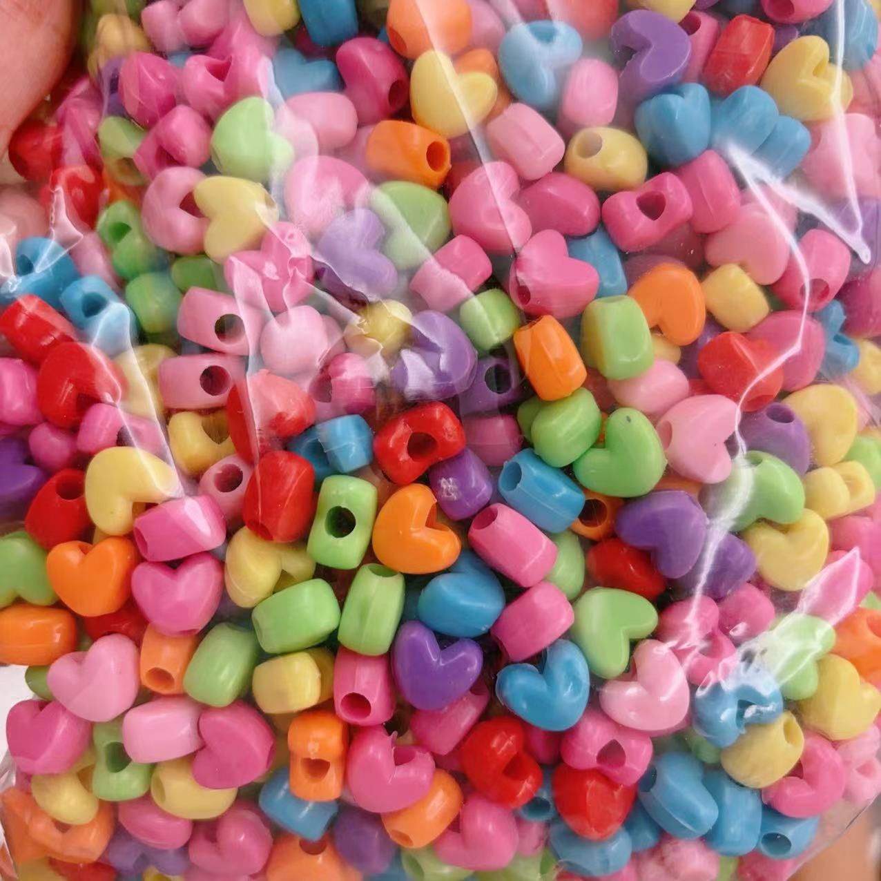 2025 Nuevas cuentas de cabello baratas en bolsa nuevas cuentas de plástico de color primavera diy gran agujero image 18