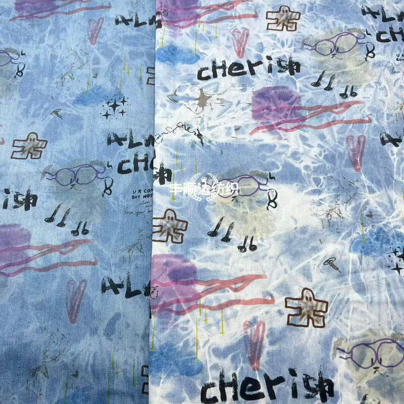 Printed cartoon paparazzi wash water Denim fabric pants coat skirt children's clothing women's clothing fabric manufacturers wholesale