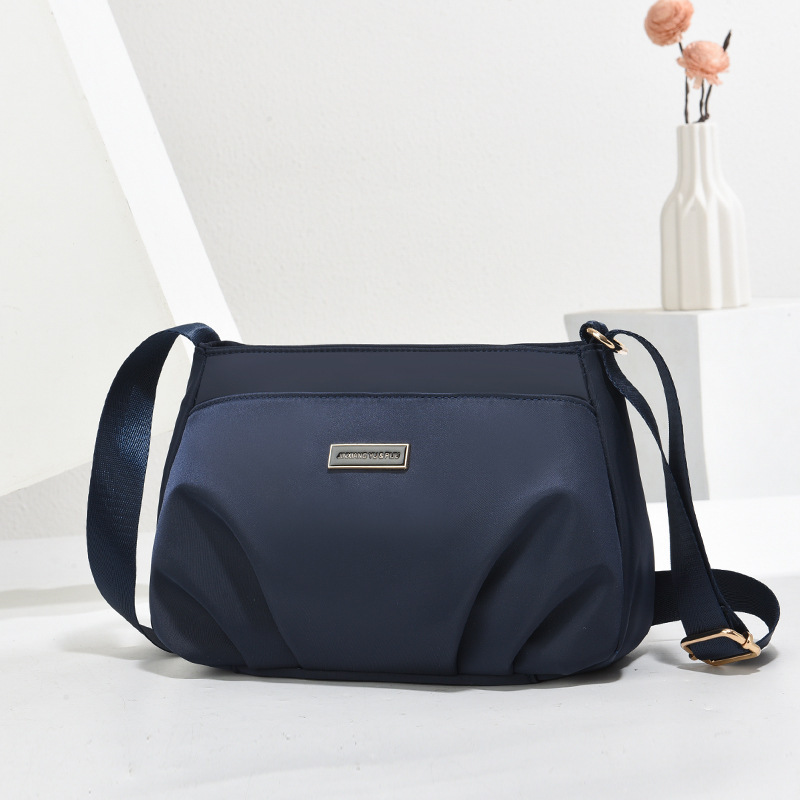 Bolsa de lona para mujeres 2025 nuevo simple hombro bolso de hombro de mediana edad bolso de madres bolso de nylon para comprar bolso de verduras