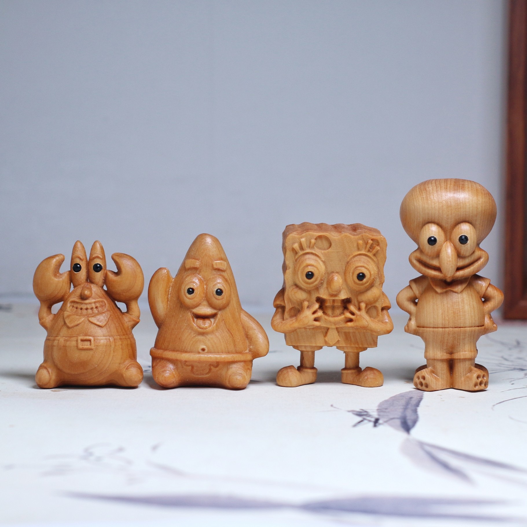 崖柏木雕海綿寶寶派大星章魚哥㙰老闆木質小擺件可愛卡通手把件兒