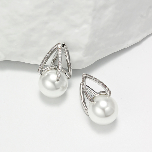 Elegant retro fashionable earrings from pearl with zircon