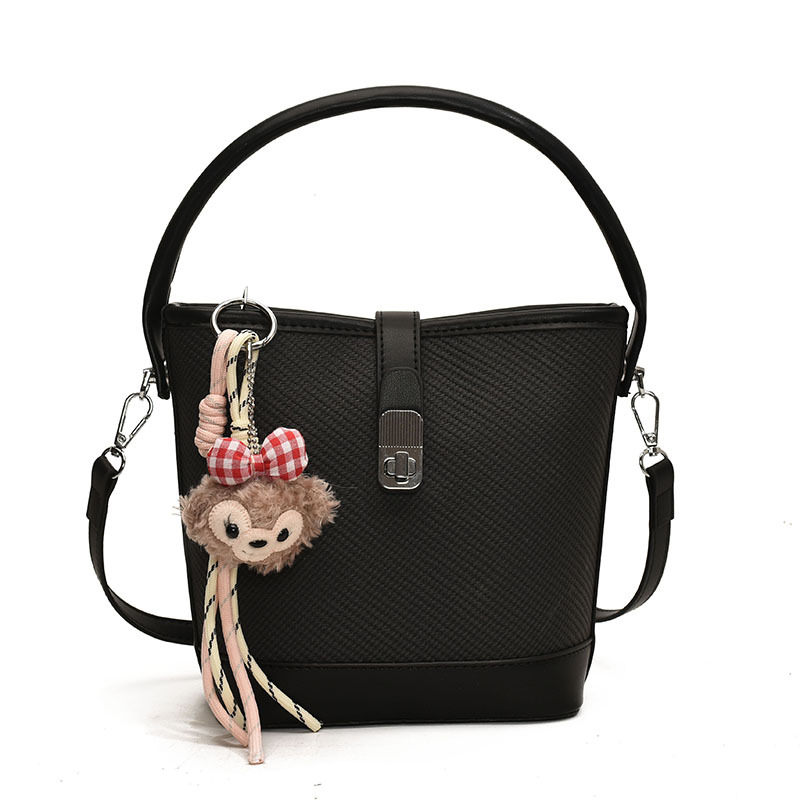 Comercio exterior transfronterizo retro bolso de cubo de mano de color 2025 nuevo nicho de alto nivel simple hombro bolso de mujer image 10