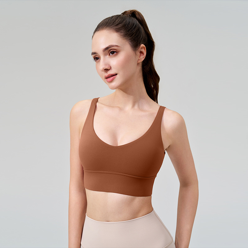 La nueva ropa interior deportiva a prueba de golpes transfronteriza para mujeres se reúne profundamente V fitness hermosa espalda desnuda con almohadilla para el pecho sujetador de yoga sin costuras